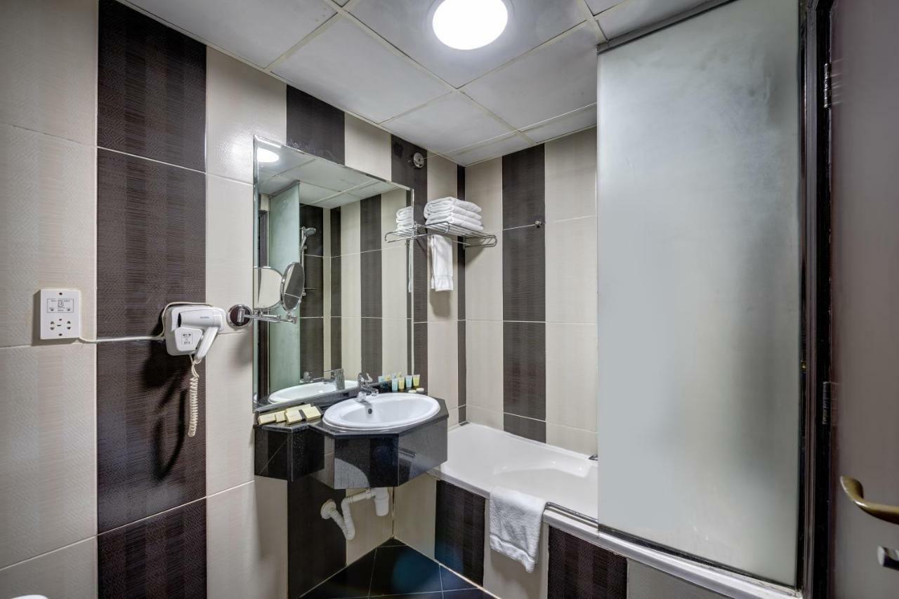 דובאי Delmon Palace Hotel מראה חיצוני תמונה