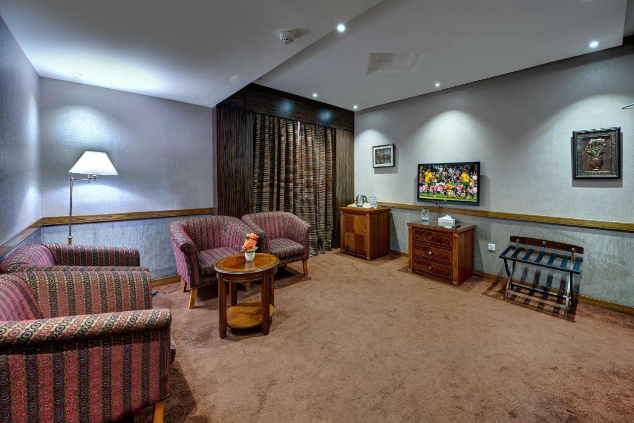דובאי Delmon Palace Hotel מראה חיצוני תמונה