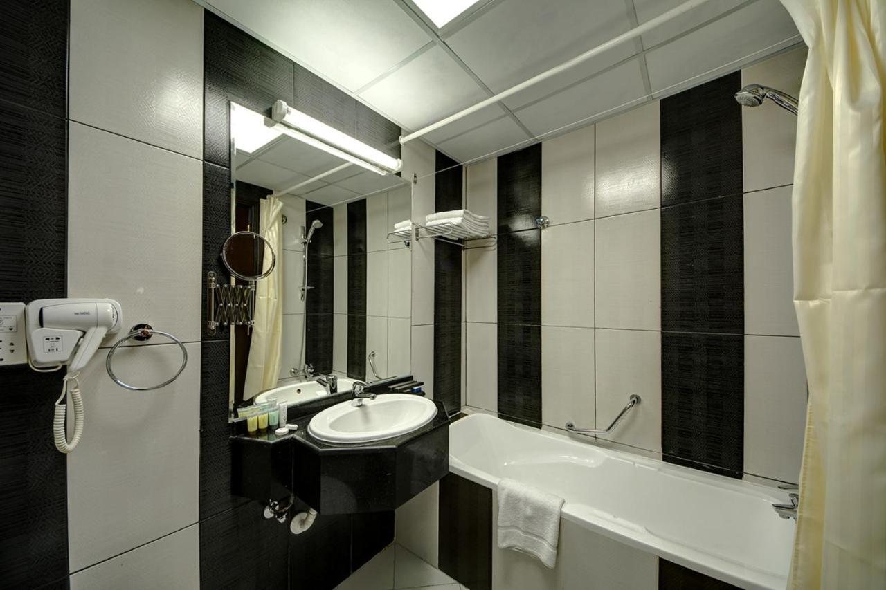 דובאי Delmon Palace Hotel מראה חיצוני תמונה